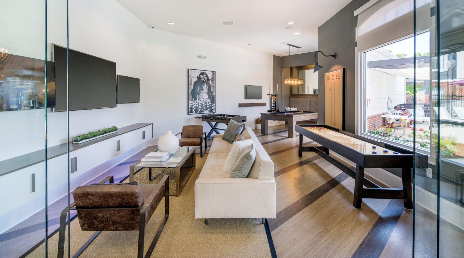 Beautiful clubroom with lounge seating and gaming areas Beautiful clubroom with lounge seating and gaming areas